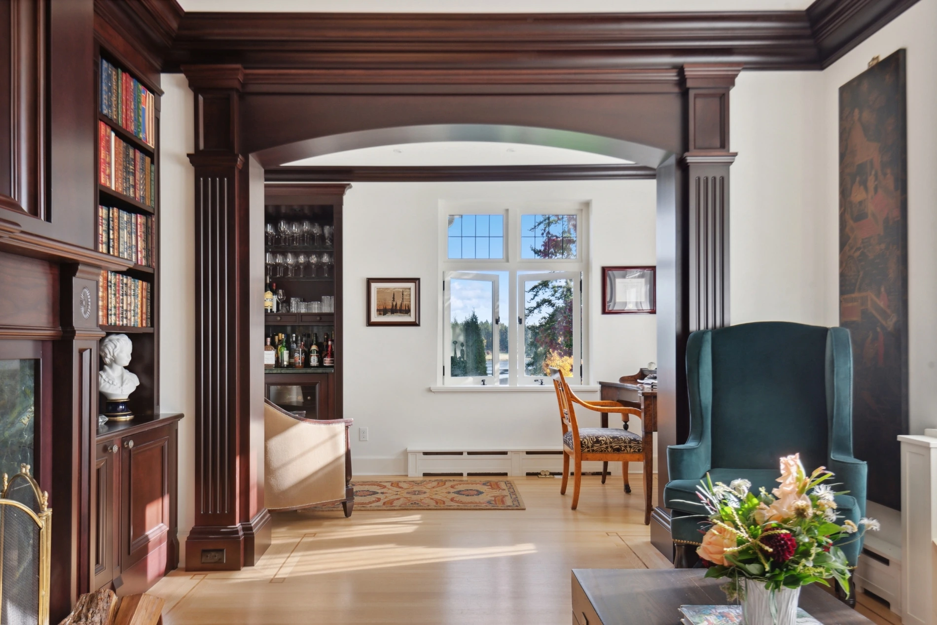 renovated heritage living room with ornate woodworking, by Somenos Construction