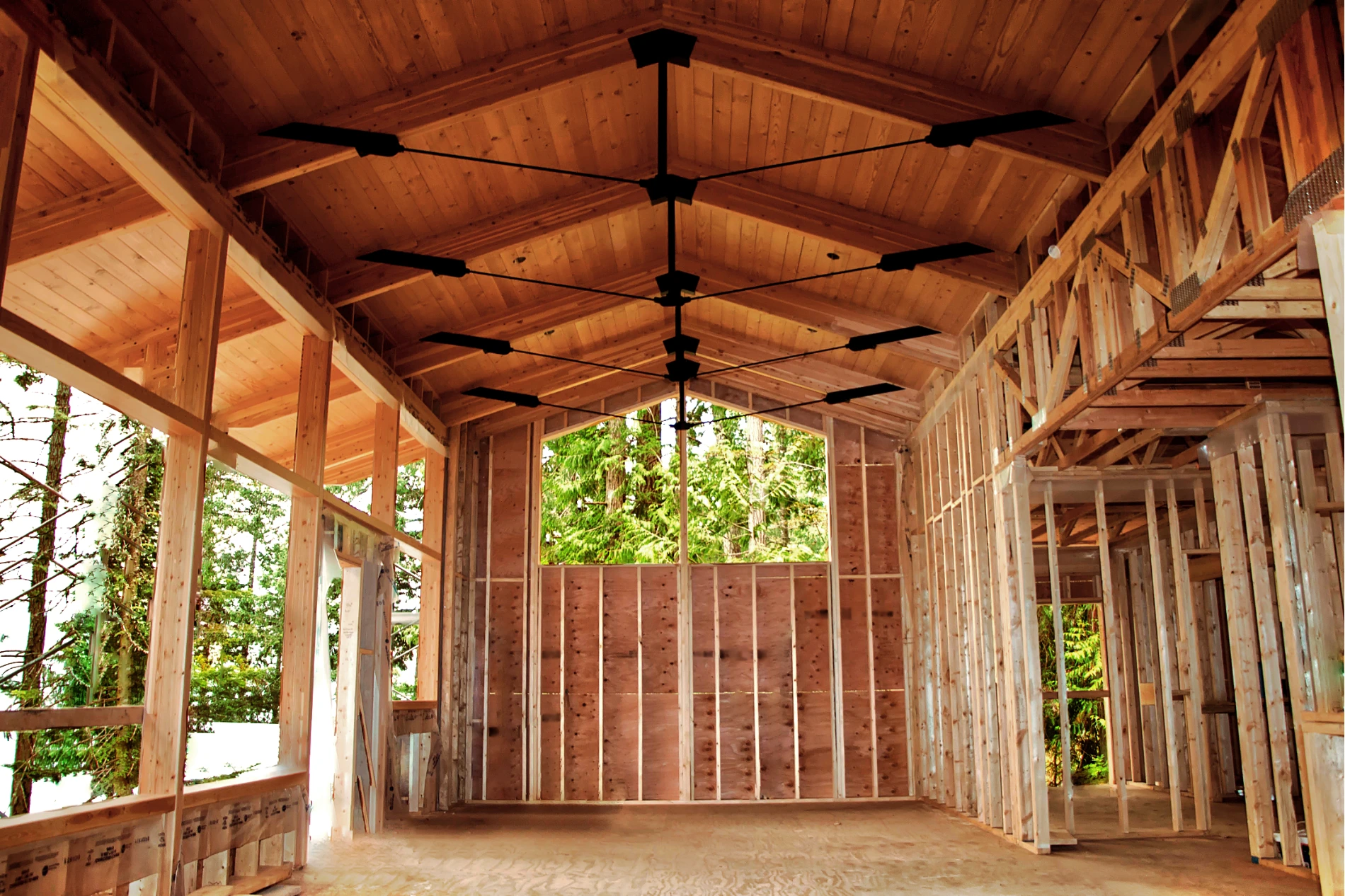 expansive living room in framing stage of construction
